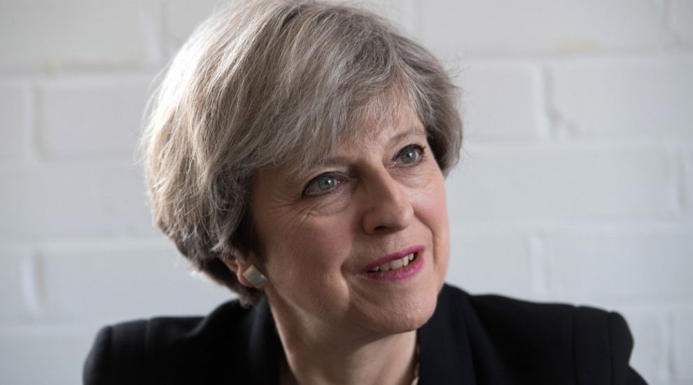 Theresa May says calls for more action by tech giants over online extremism