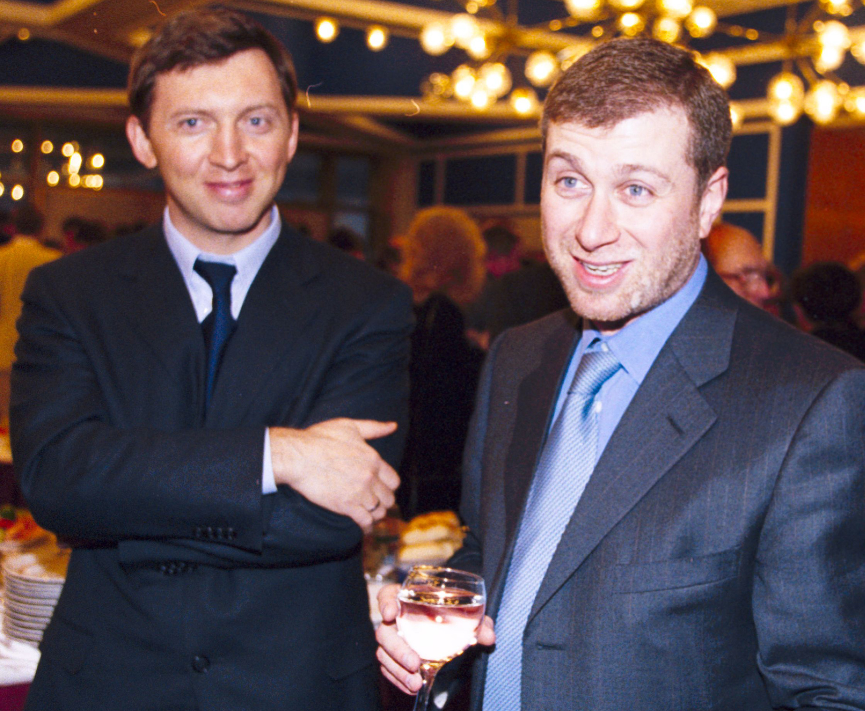 deripaska abramovich - MOSCOW, RUSSIA - MAR 29: Russian oligarch Oleg Deripaska, left, and Roman Abramovich, attend a meeting between Russian president Vladimir Putin and Russian businessmen in the Kremlin on Wednesday, March 29, 2006.