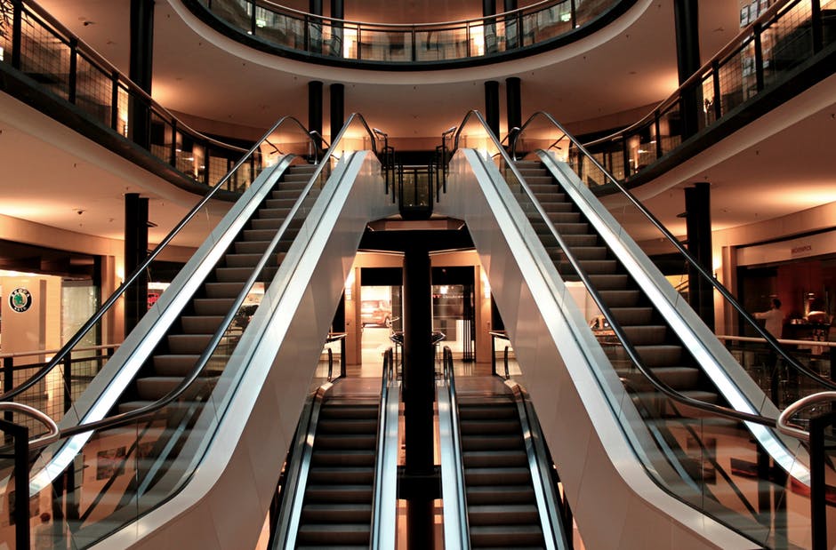escalator stairs metal segments architecture mall shopping centre retail