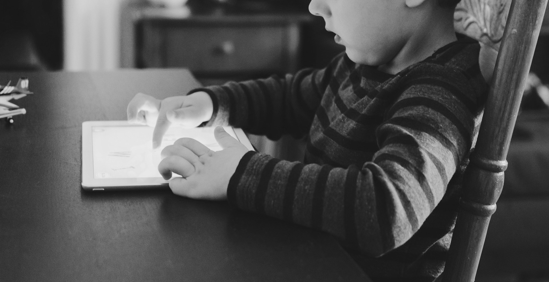 child iPad tablet technology
