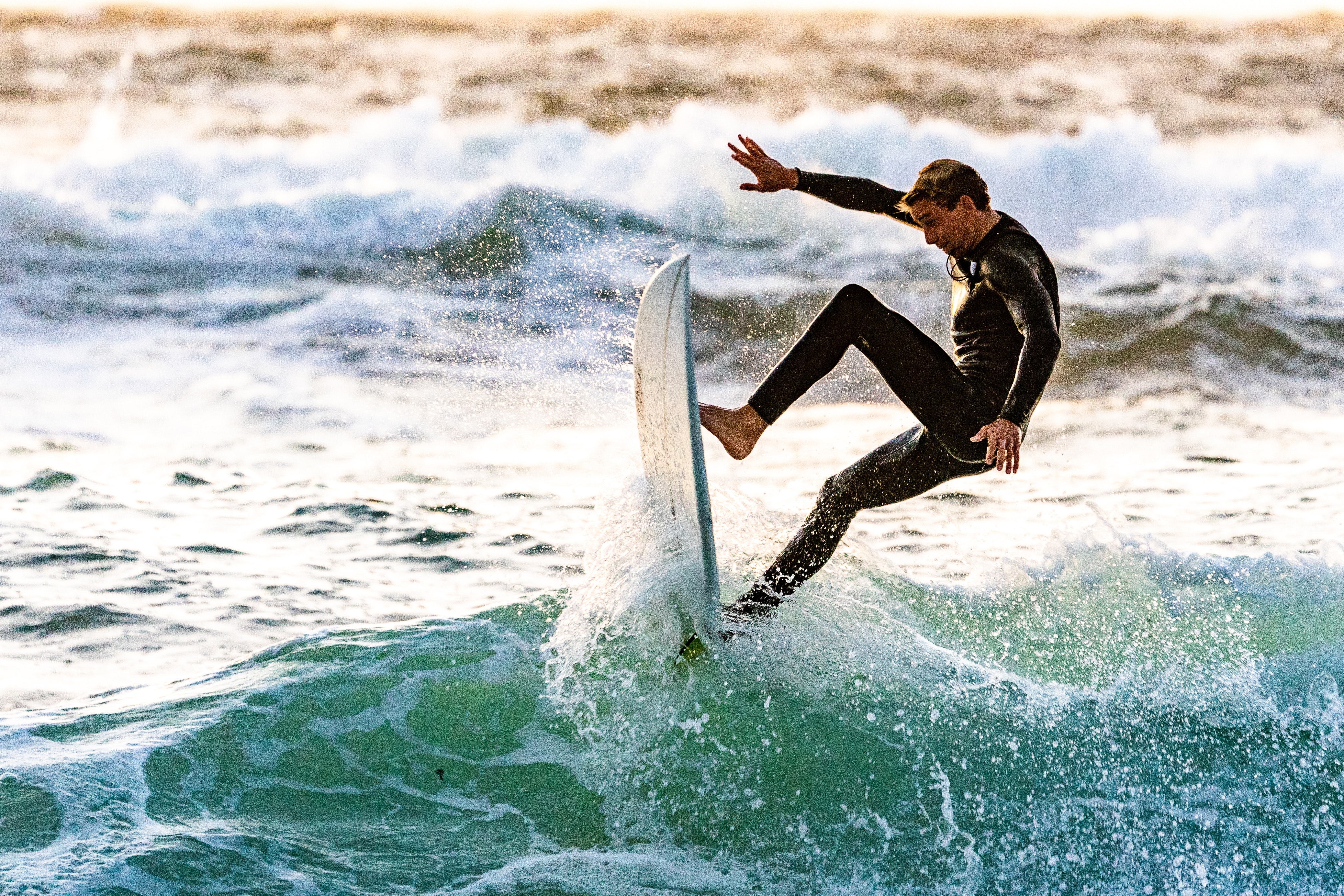 surfer-performing-tricks-1654498.jpg