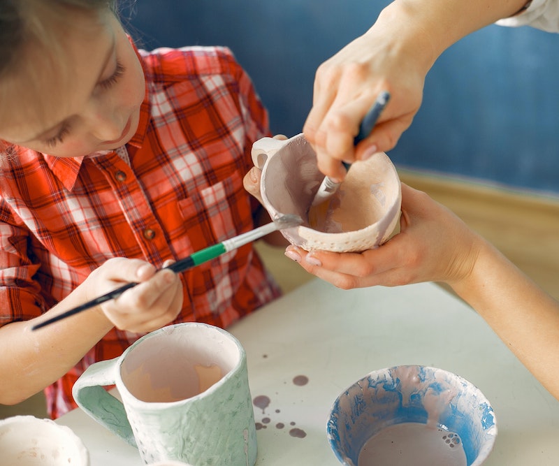 child_doing_pottery.jpg