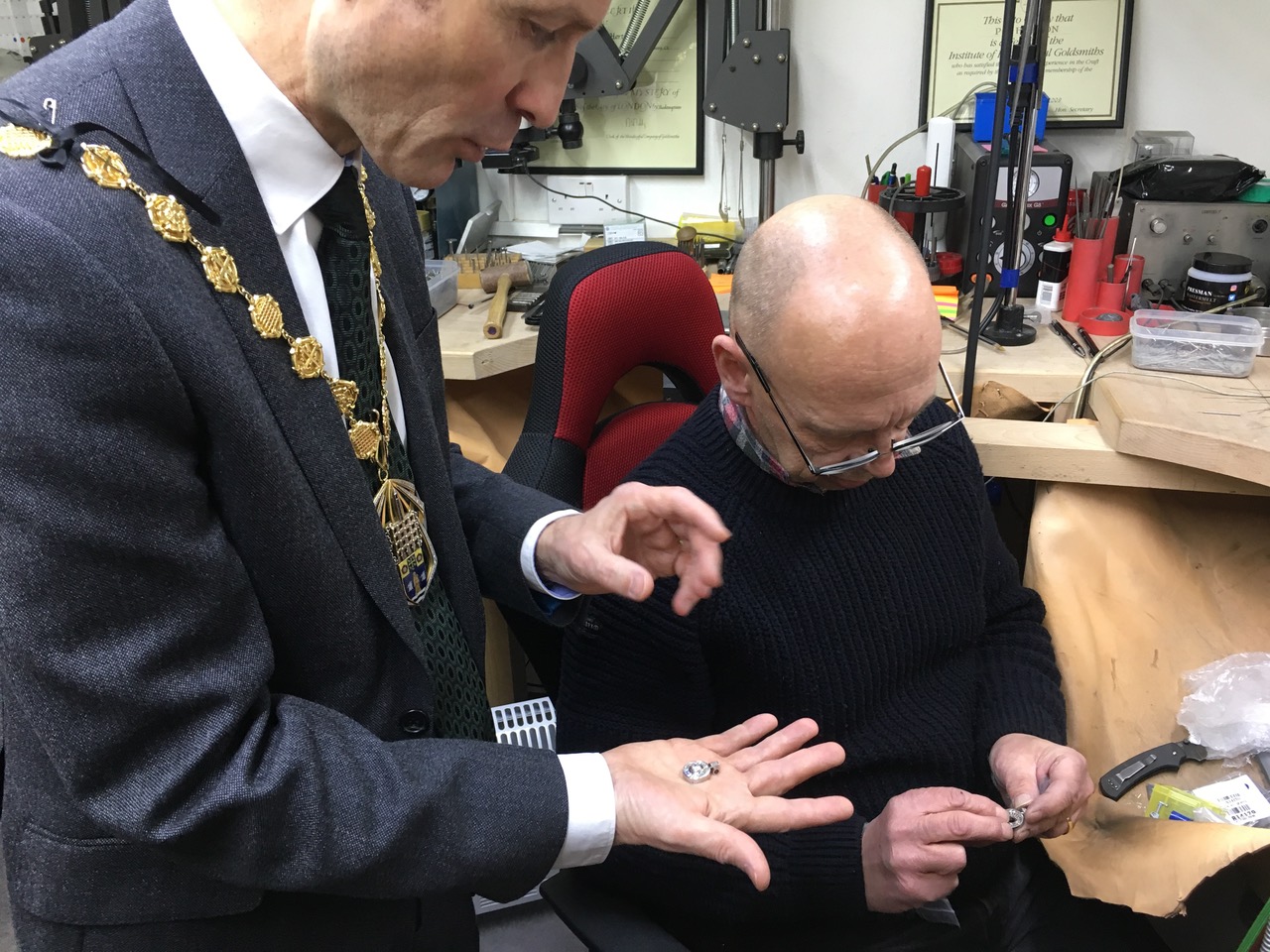 Councillor_Ian_Adams_and_Jeweller_Phil_Horton_take_a_closer_look_at_the_jewellery.jpeg