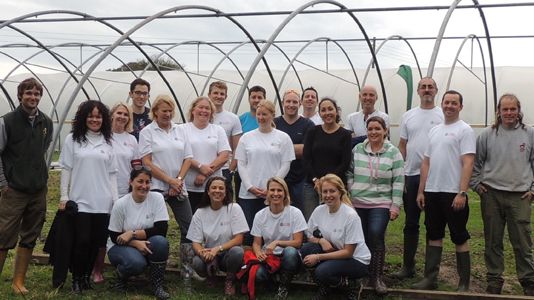 UBS Dons Gardening Gear for Durrell