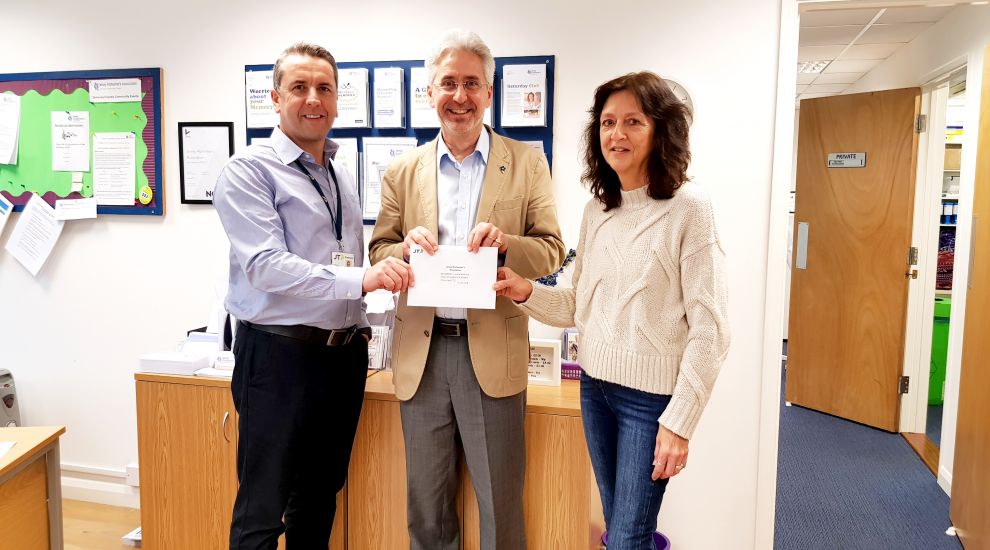 JT donates £10,000 to Jersey Alzheimers' Association