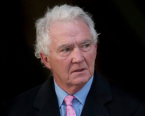 Trio face Anglo Irish share charges