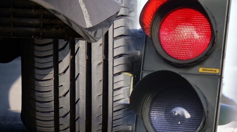 Police seek driver who 'ran red light'