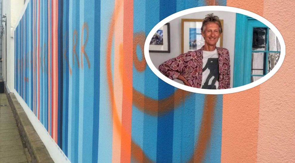 Artist teases new look for vandalised climate mural