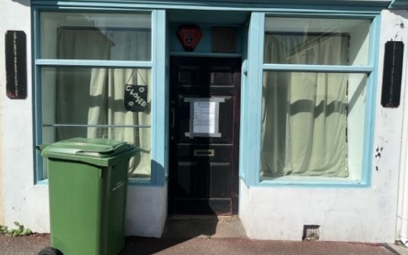 Plans to convert a former shop into a one-bedroom flat