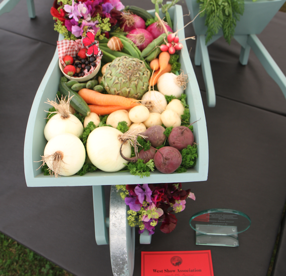 Schools put vegetables and herbs on display for mini-wheelbarrow competition
