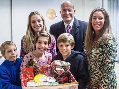 Sure and Mawson Collins staff provide hampers for families of children with special needs