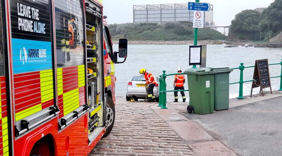 Firefighters called to rescue car from rising tide