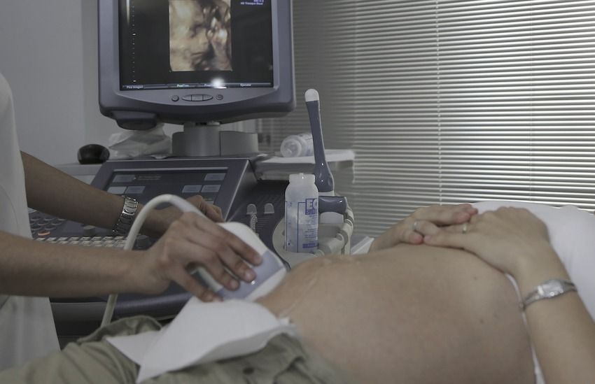 Partners banned from antenatal scans