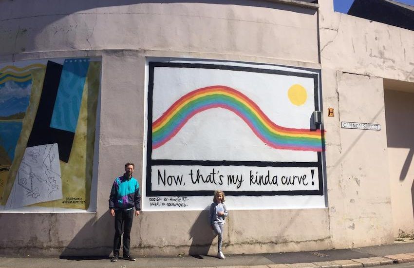 ART FIX: Street artist’s niece designs rainbow mural