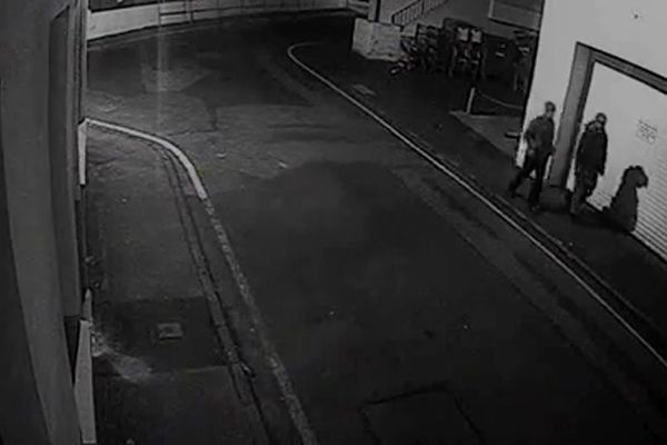 Police release video of two men sought in relation to suspected fire