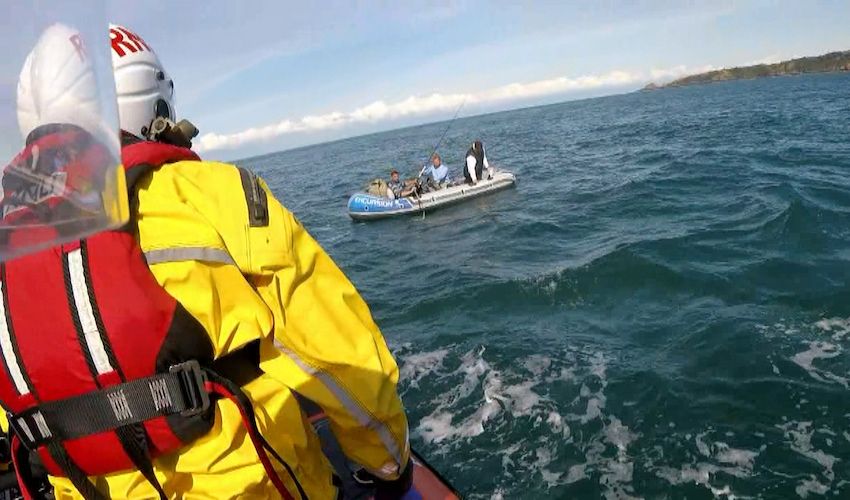 Trio rescued after being carried away by wind and tide