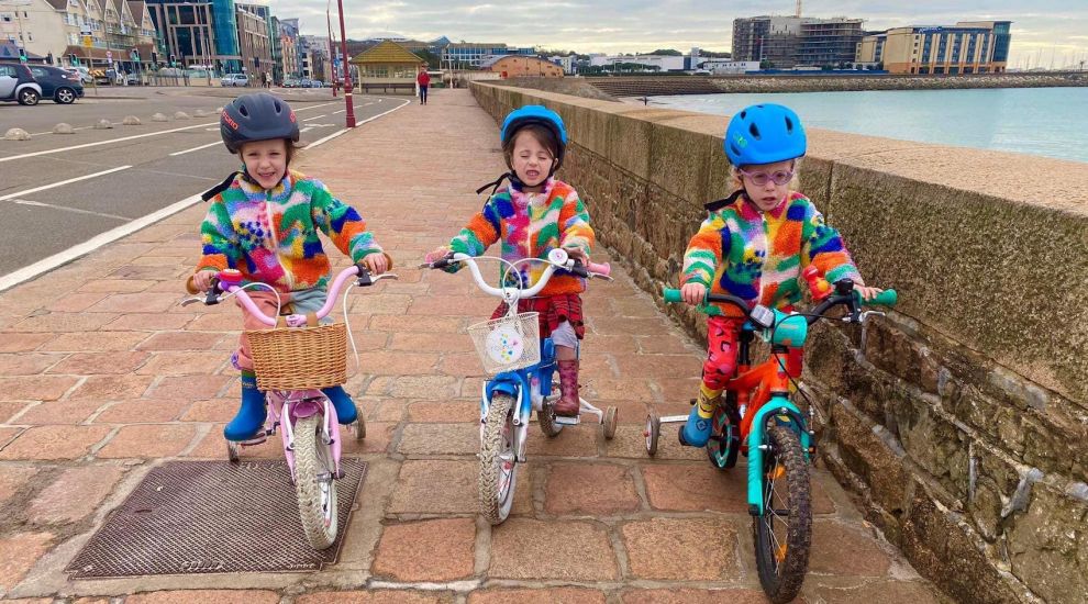 Triplets take on 6km bike ride to help save the planet