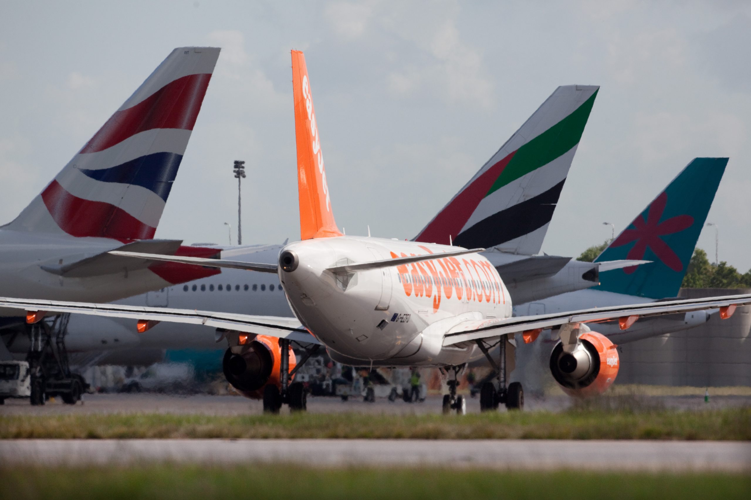 gatwick-tailfins.jpg easy jet British airways airport flight airplane