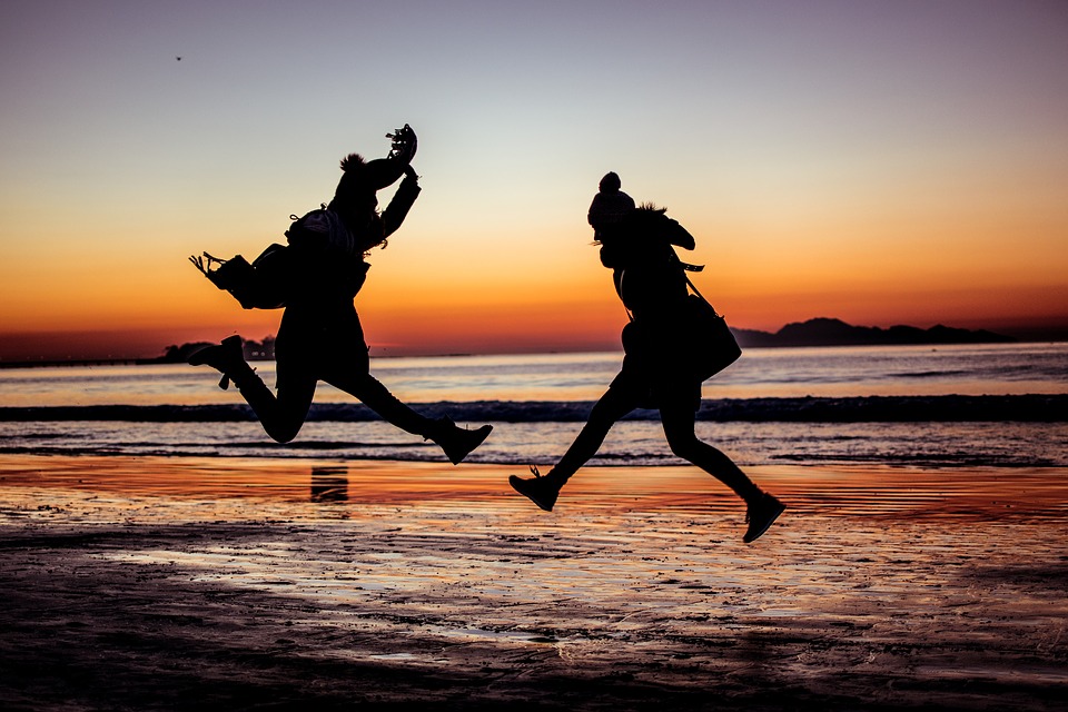 happyhappinesswellbeingwinterbeachsunsetjump.jpg