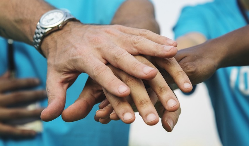 charity_giving_volunteer_teamwork.jpg