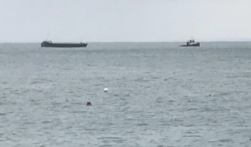 Ship towed back Bouley Bay.jpg