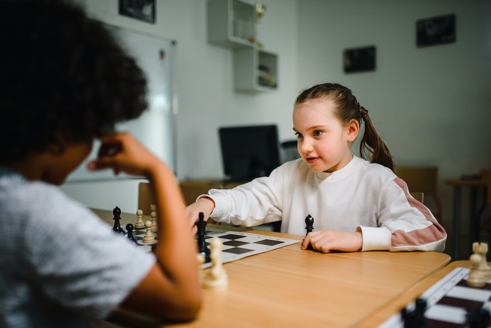 two_children_playing_chess.jpg