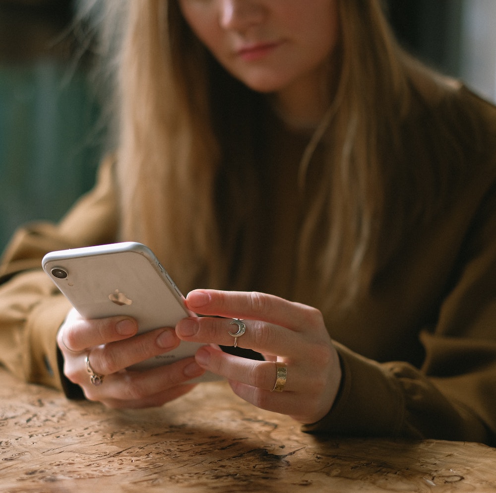woman_playing_on_phone.jpg
