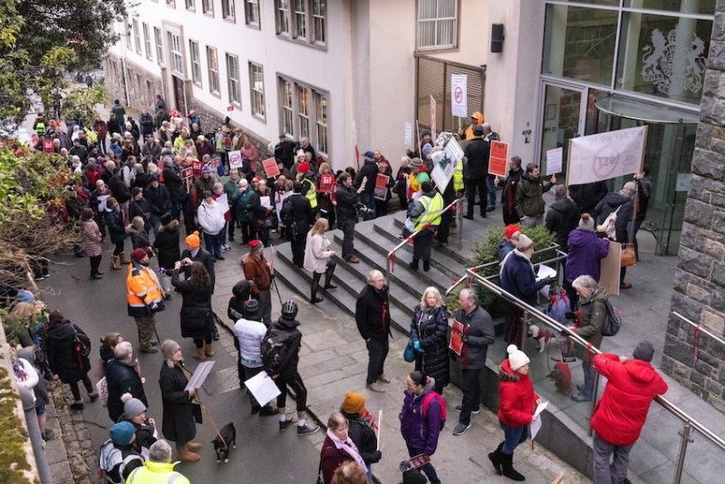 People protesting outside Guernsey's Royal Court.