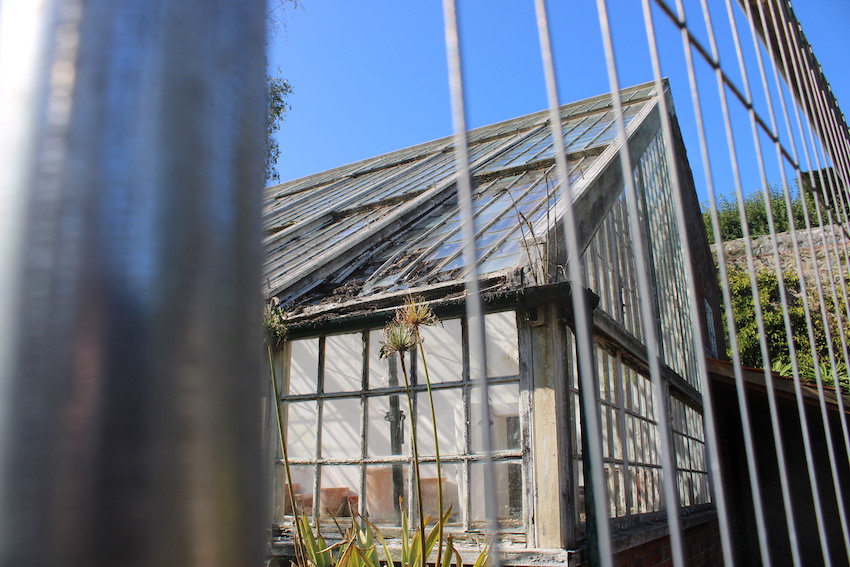 Candie_Gardens_lower_greenhouse_fence.JPG