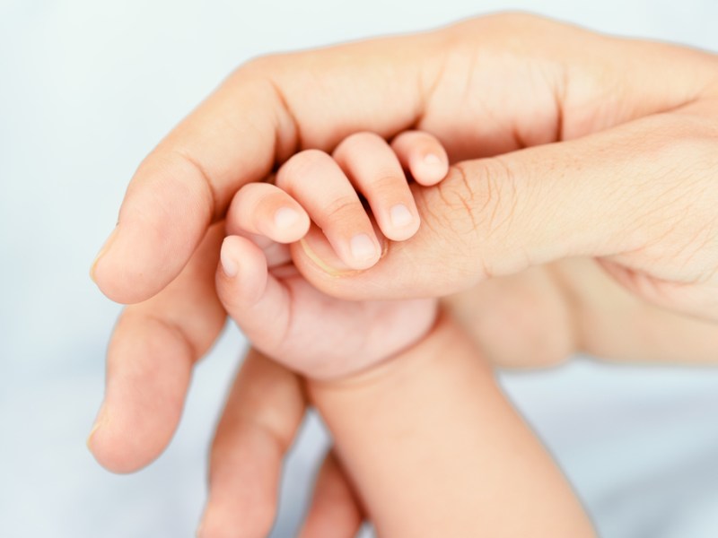 mother_baby_hand_stock.jpg