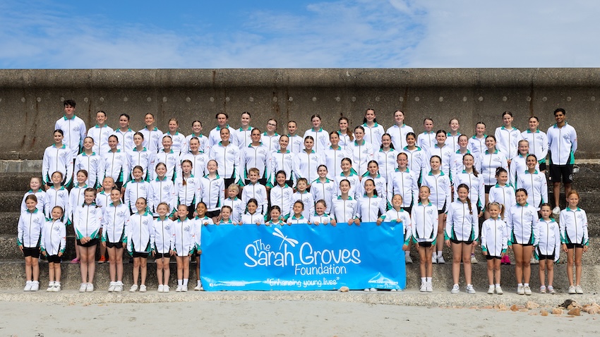 Dance_World_Cup_team_with_Sarah_Groves_Foundation_banner_2024.jpg