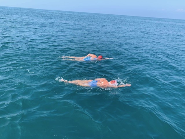 Support_swimmer_with_Karen_in_the_water_during_the_swim.jpg