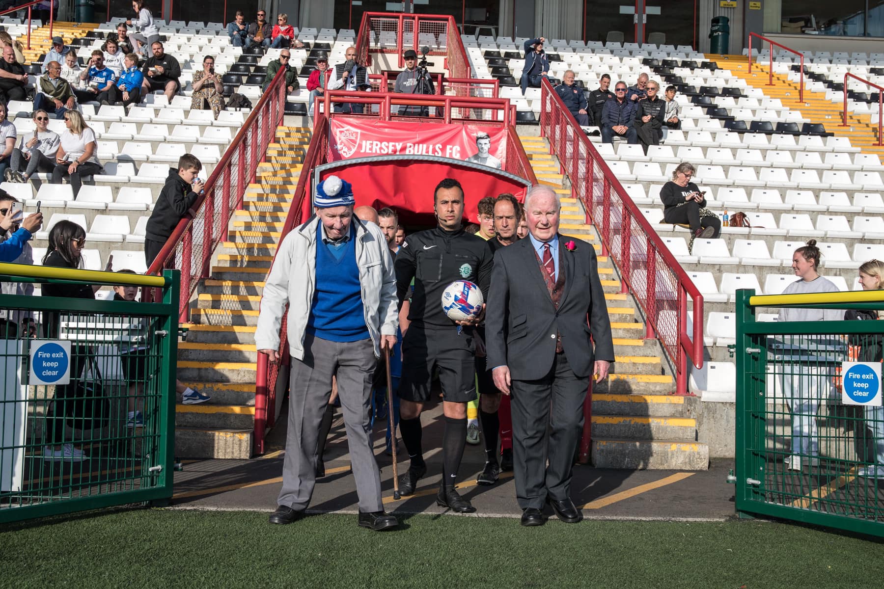 Jeremie_Cup_2023._Leading_out_their_life_long_clubs_George_along_side_Tom_Du_Feu_ex_President_of_St_Peters_FChis_long_term_friend_and_collegue_from_their_time_working_together_for_the_Jersey_Football_Combinat.jpg