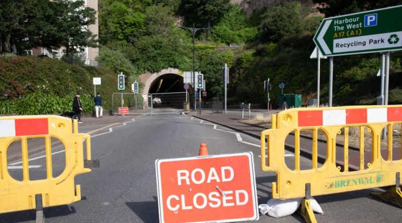 The tunnel under Fort Regent with road closure signs.