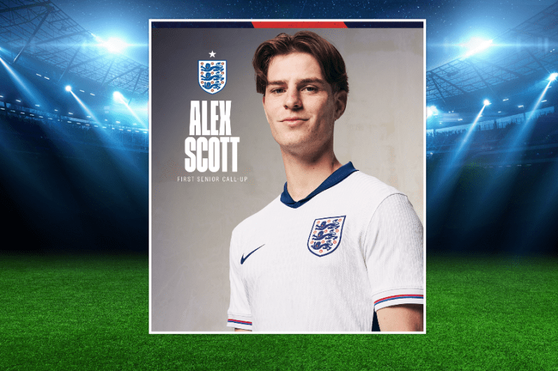 A young footballer in an England football top.