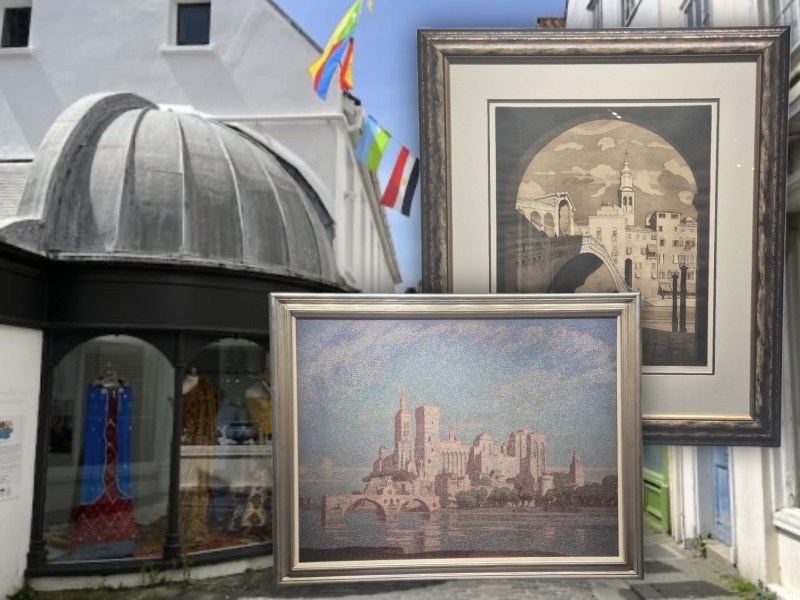 Photo of a gallery exterior with colourful flags, overlaid with two framed artworks: a monochrome architectural scene and a pointillist painting of a riverside fortress.