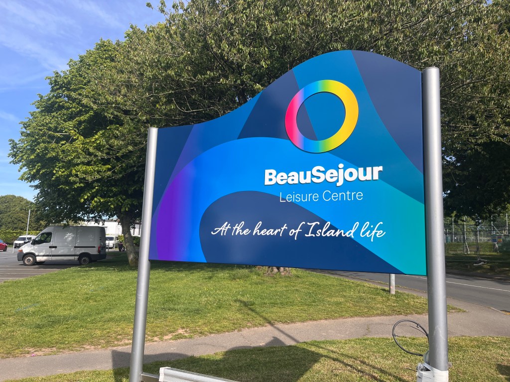 A sign - it reads Beau Sejour