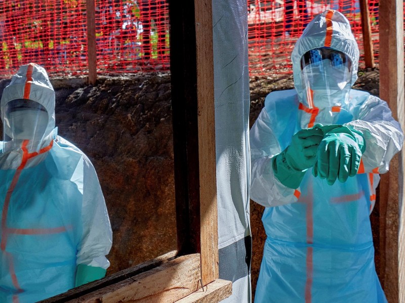 People in the Democratic Republic of Congo in full personal protective equipment - PPE.