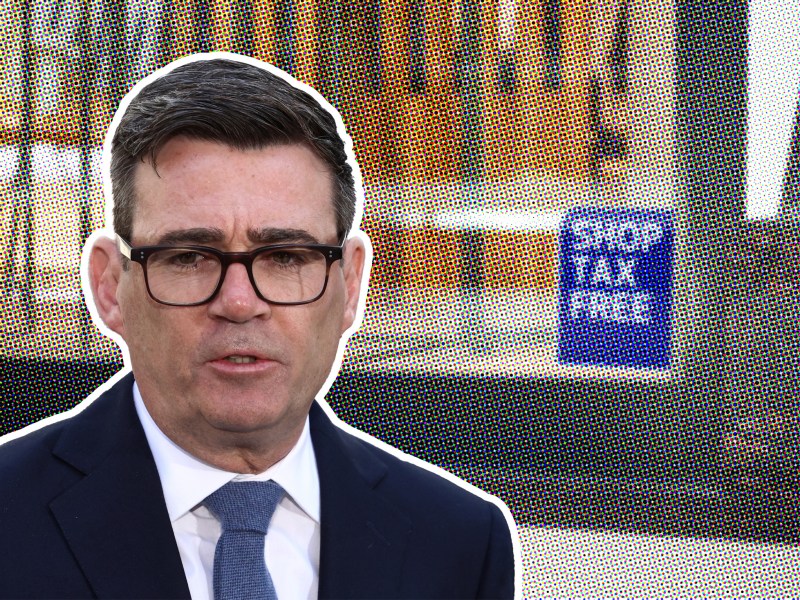 UK PM Andy Burnham in front of a shop tax free sign.