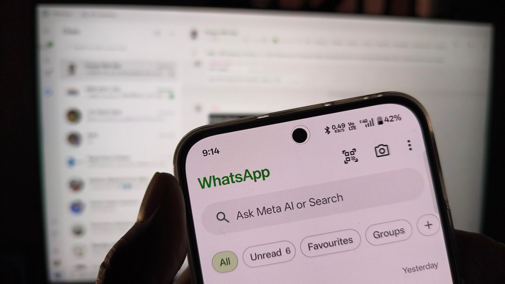 Smartphone displaying whatsapp.
