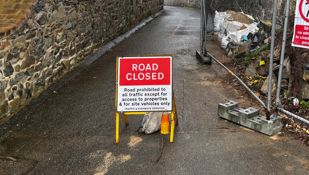A road closed sign.