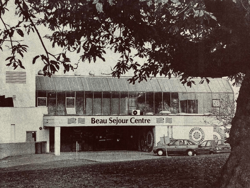 A black and white photo of the front of the old Beau Sejour Centre