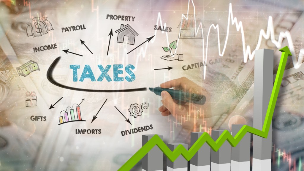 Taxation systems, fiscal policy adjustment, government revenue tracking, and the macroeconomic financial sector are developing strongly. A hand drawing a diagram of TAXES with branches like income, property, sales, and dividends, superimposed with a rising financial bar chart and stock data indexes over US dollar bills. The national fiscal economy and corporate net profits grew. Public sector investment and financial revenue trade development are expanding.