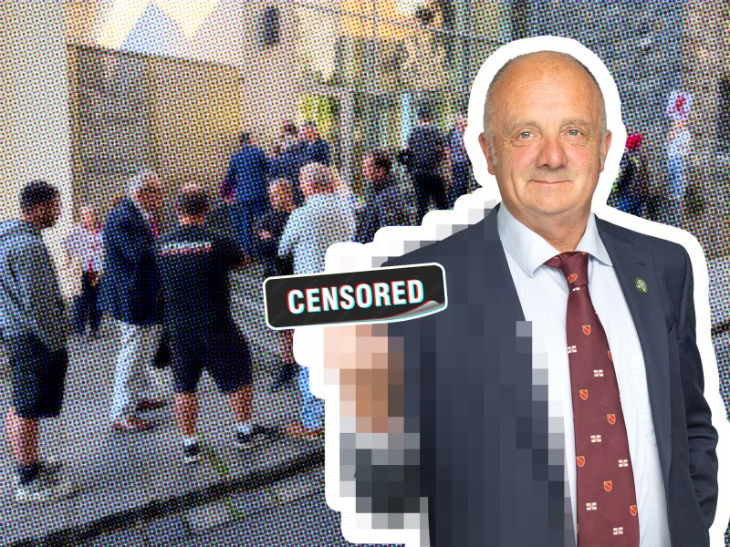 A pixelated composite image of a bald man giving a finger.